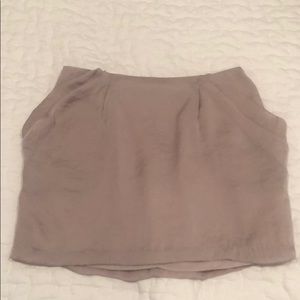 3 for $25. Tan mini skirt